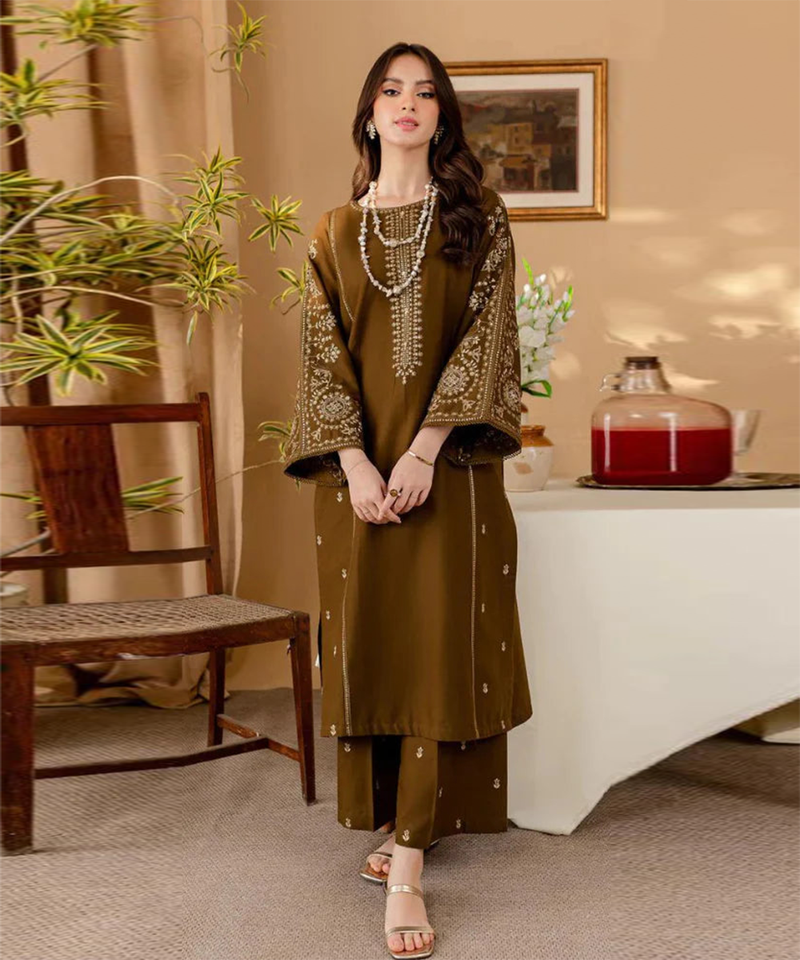 Shop Saadgi's 2-Piece Dhanak Suit featuring an embroidered shirt and matching trouser, designed for elegant and professional looks. Ideal for formal occasions and gatherings.